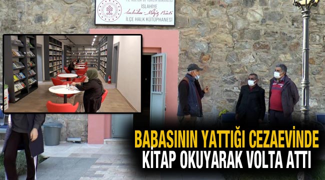 Babasının yattığı cezaevinde kitap okuyarak volta attı