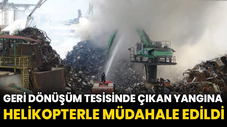 Geri dönüşüm tesisinde çıkan yangına helikopterle müdahale edildi