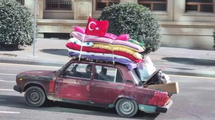 Yorganları eski aracına bağladığı fotoğrafıyla tanınan Server Beşirli Türkiye’ye geliyor