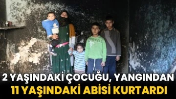 2 yaşındaki çocuğu, yangından 11 yaşındaki abisi kurtardı