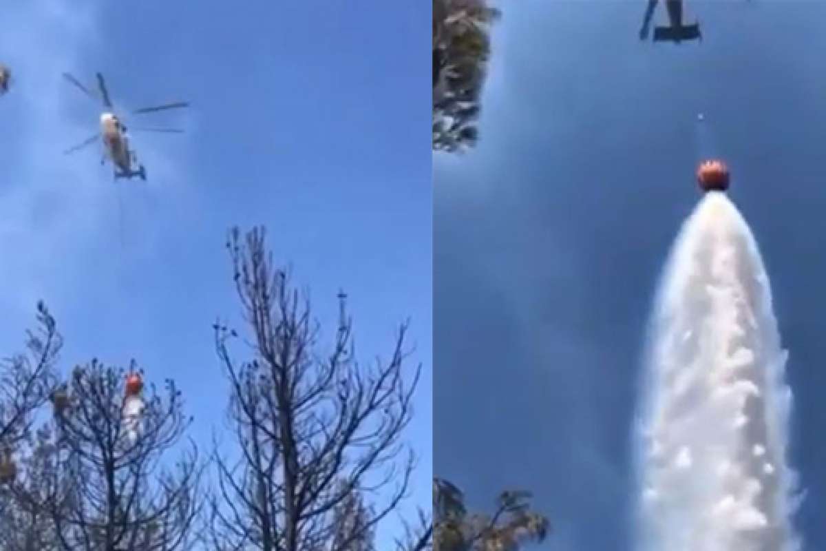 Canlı yayın yaparken helikopter üzerine su boşalttı