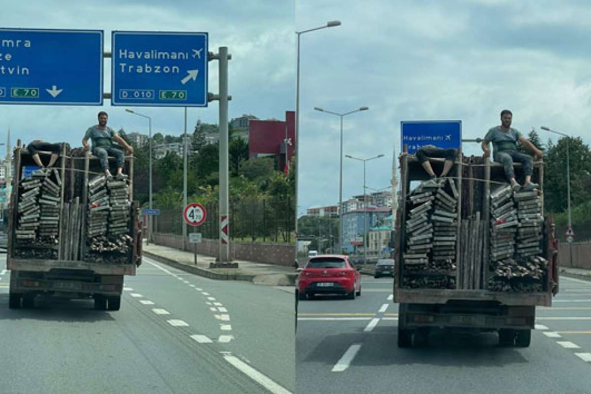 Kamyon kasasındaki inşaat iskeleleri üzerinde tehlikeli yolculuk