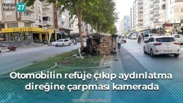 Otomobilin refüje çıkıp aydınlatma direğine çarpması kamerada