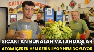 Sıcaktan bunalan vatandaşlar atom içerek hem serinliyor hem doyuyor