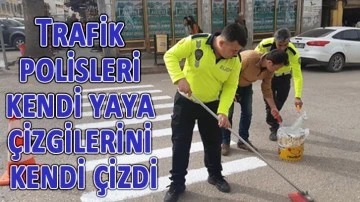 Trafik polisleri kendi yaya çizgilerini kendi çizdi